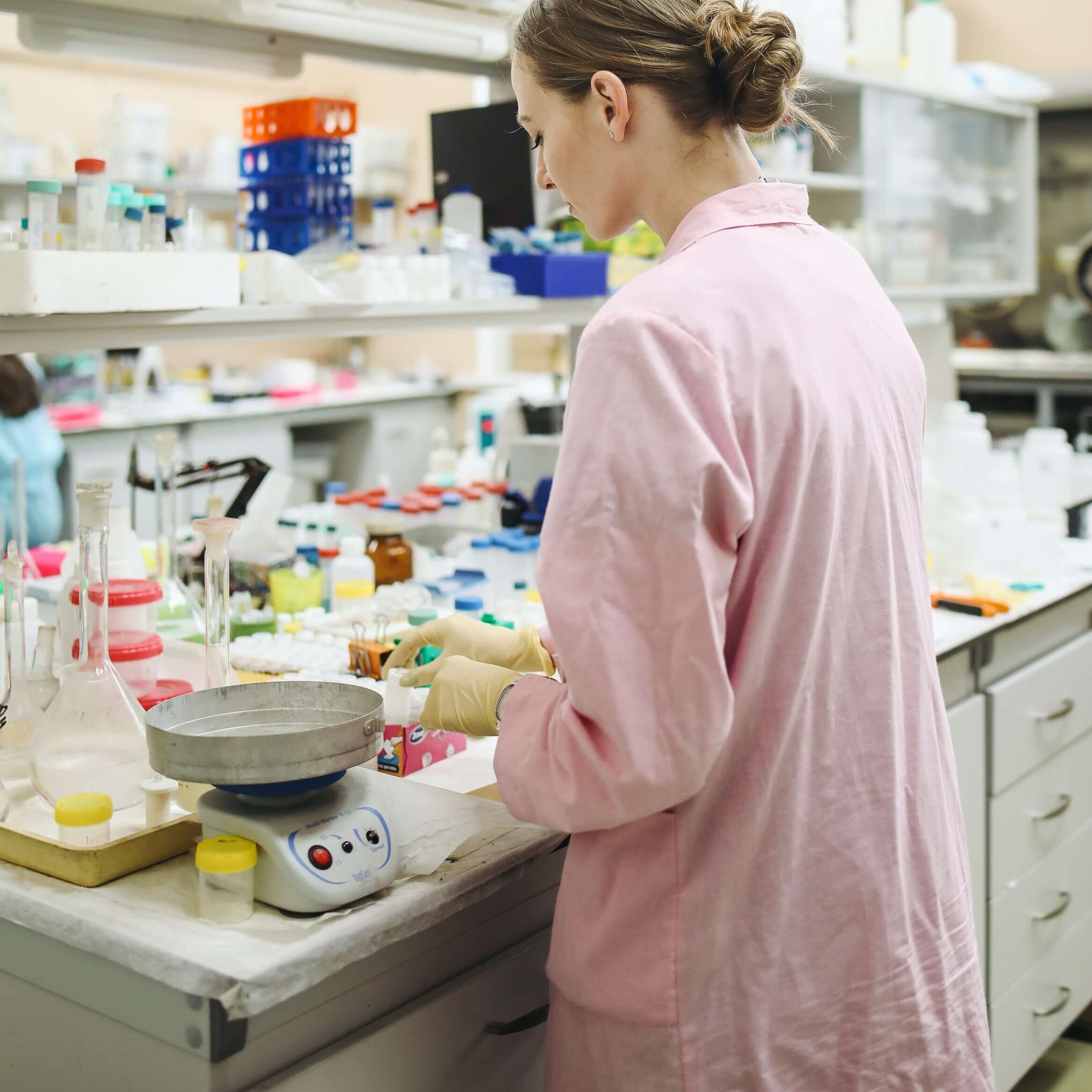 lab workers assessing the relationship between sleep and allergies 
